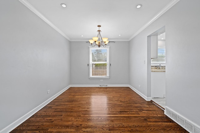 unfurnished dining area with recessed lighting, an inviting chandelier, ornamental molding, and wood finished floors