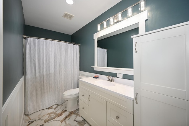 bathroom featuring visible vents, vanity, toilet, marble finish floor, and a shower with shower curtain