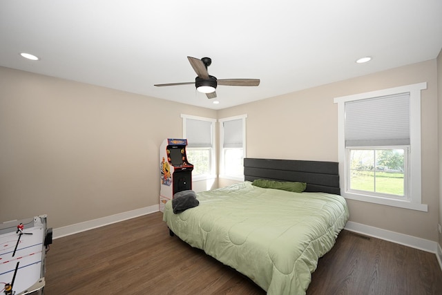 bedroom with recessed lighting, baseboards, a ceiling fan, and wood finished floors