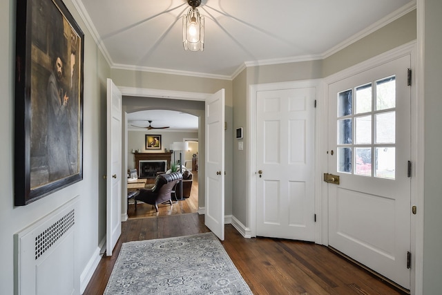 36W722 Crane Rd, Saint Charles, IL 60175 - foyer with a ceiling fan, radiator, dark wood-type flooring, baseboards, and ornamental molding