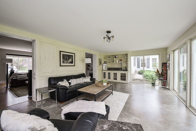 36W722 Crane Rd, Saint Charles, IL 60175 - living room with ornamental molding, tile patterned floors, and built in features