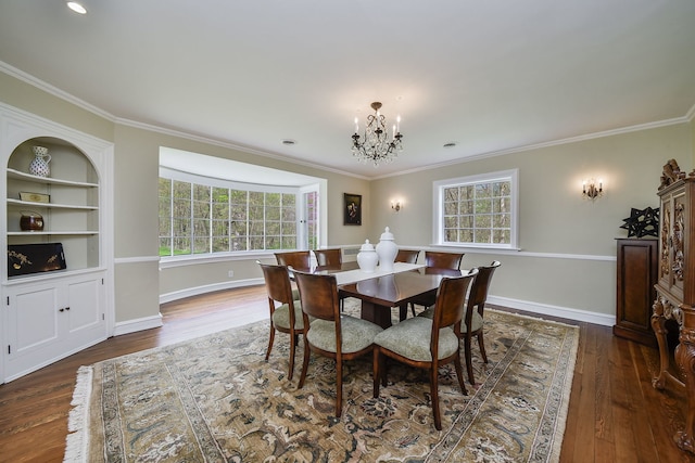 36W722 Crane Rd, Saint Charles, IL 60175 - dining space with ornamental molding, a notable chandelier, plenty of natural light, and dark wood-type flooring