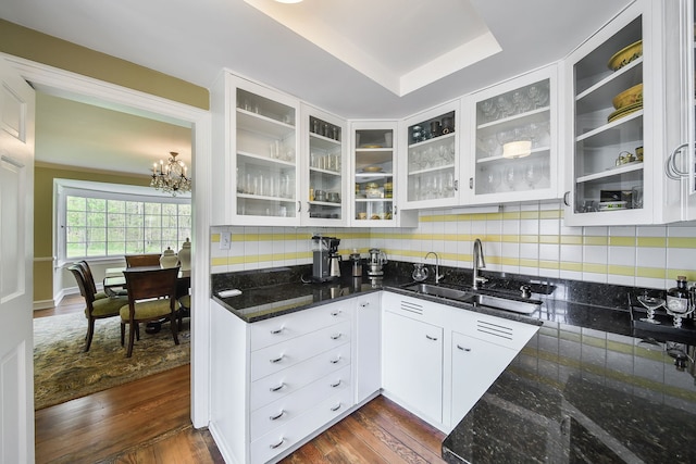 36W722 Crane Rd, Saint Charles, IL 60175 - kitchen featuring tasteful backsplash, dark stone countertops, and a sink