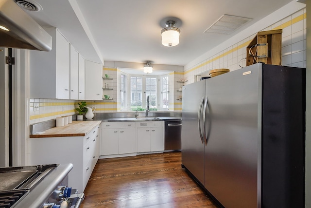 36W722 Crane Rd, Saint Charles, IL 60175 - kitchen featuring butcher block counters, open shelves, visible vents, white cabinets, and appliances with stainless steel finishes