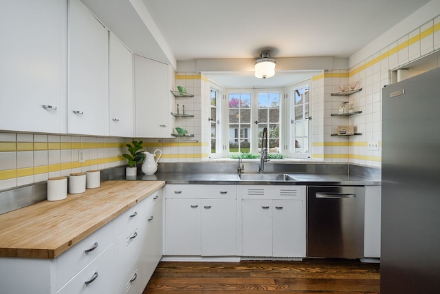 36W722 Crane Rd, Saint Charles, IL 60175 - kitchen with stainless steel counters, decorative backsplash, appliances with stainless steel finishes, and a sink