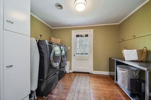 36W722 Crane Rd, Saint Charles, IL 60175 - clothes washing area featuring independent washer and dryer, wood finished floors, laundry area, ornamental molding, and visible vents