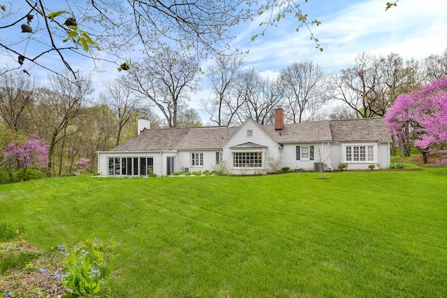36W722 Crane Rd, Saint Charles, IL 60175 - rear view of property featuring a chimney and a lawn
