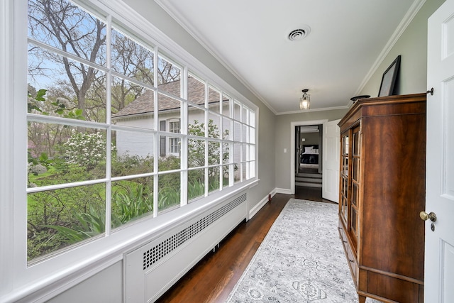 36W722 Crane Rd, Saint Charles, IL 60175 - hall with ornamental molding, a wealth of natural light, visible vents, and a baseboard heating unit