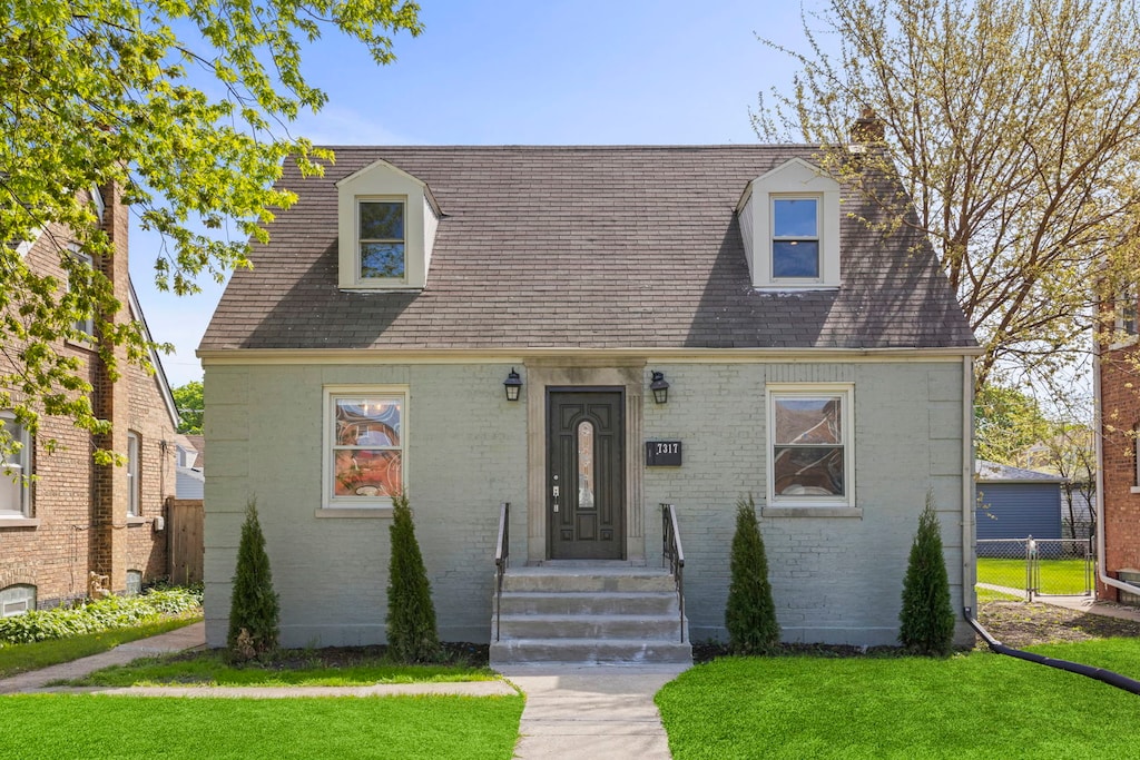 7317 S Sacramento Ave, Chicago, IL 60629 - cape cod home with brick siding and roof with shingles