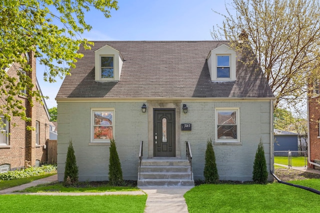 7317 S Sacramento Ave, Chicago, IL 60629 - cape cod home with brick siding and roof with shingles