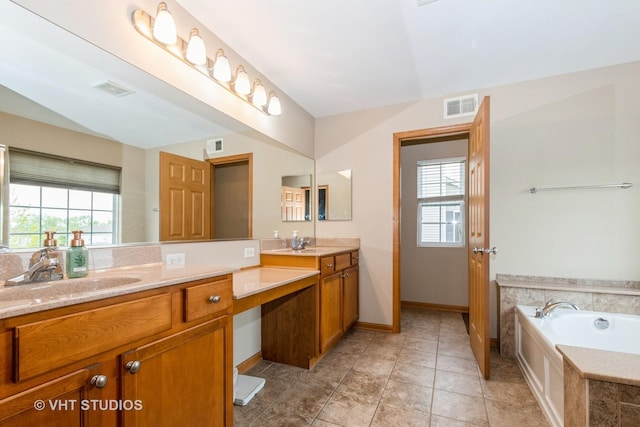 685 Veronica Ct, New Lenox, IL 60451 - bathroom with healthy amount of natural light, double vanity, a bath, and baseboards