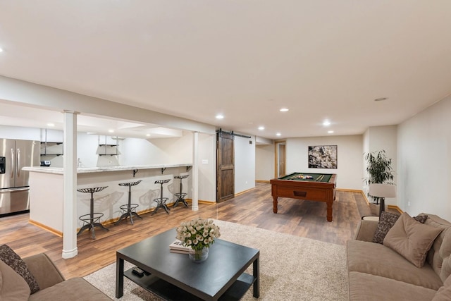 685 Veronica Ct, New Lenox, IL 60451 - living area with bar area, a barn door, billiards table, light wood-style flooring, and recessed lighting