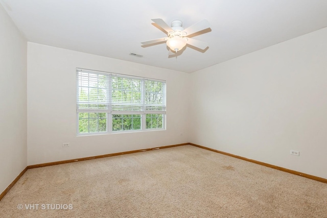 685 Veronica Ct, New Lenox, IL 60451 - carpeted spare room featuring baseboards and a ceiling fan
