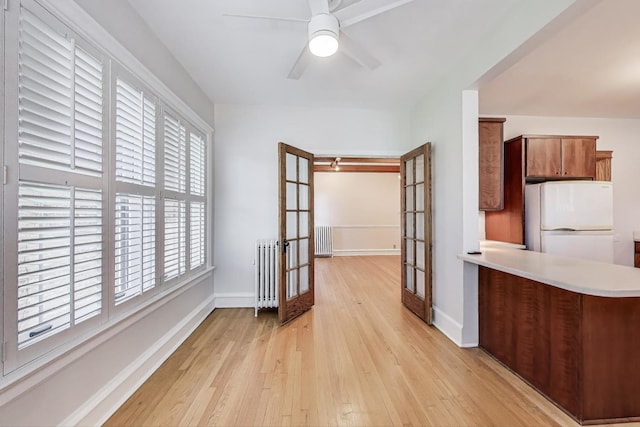 1431 W Rascher Ave Unit 1W, Chicago, IL 60640 - kitchen featuring freestanding refrigerator, light wood-type flooring, french doors, light countertops, and ceiling fan