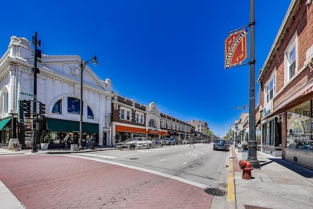 1431 W Rascher Ave Unit 1W, Chicago, IL 60640 - view of asphalt street with street lights, sidewalks, and curbs