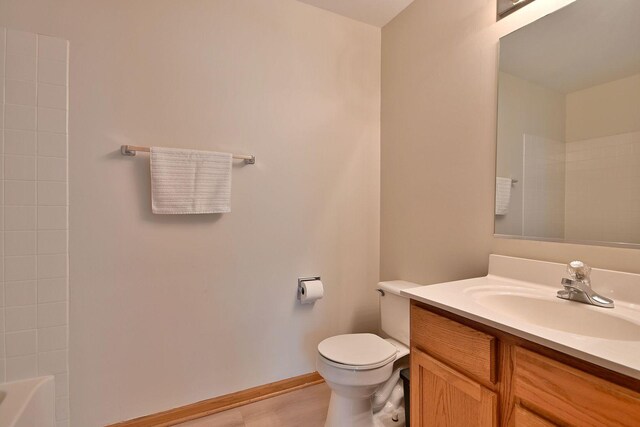 3244 Foxridge Ct, Woodridge, IL 60517 - bathroom with vanity, toilet, and baseboards