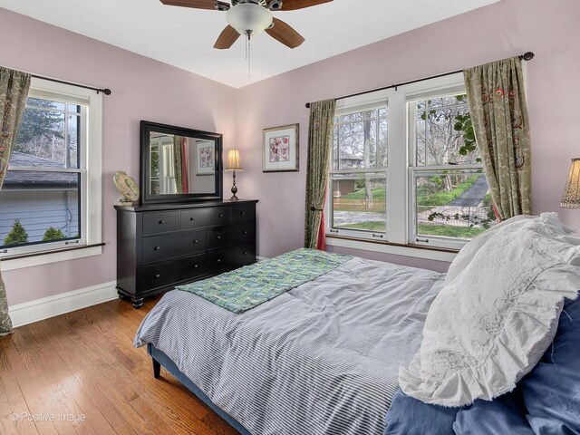 303 Anthony St, Glen Ellyn, IL 60137 - bedroom featuring wood finished floors, baseboards, and a ceiling fan