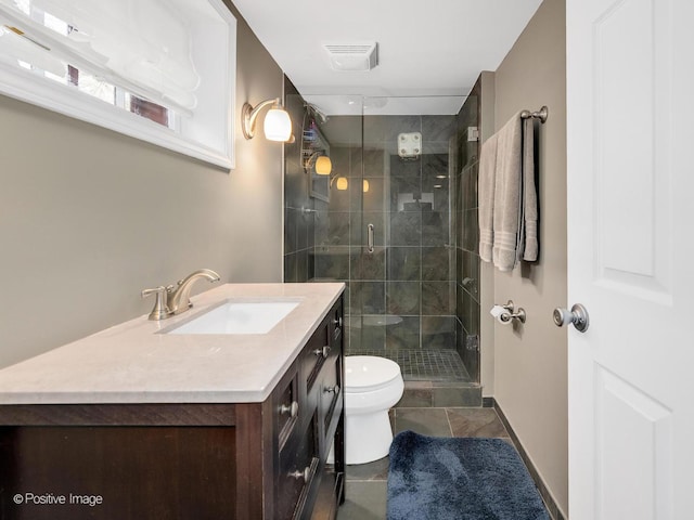 303 Anthony St, Glen Ellyn, IL 60137 - bathroom featuring toilet, a stall shower, and vanity