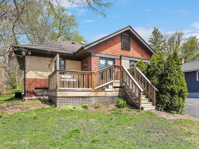 303 Anthony St, Glen Ellyn, IL 60137 - back of property with a lawn, brick siding, and roof with shingles
