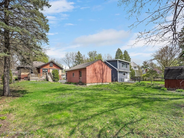 303 Anthony St, Glen Ellyn, IL 60137 - view of grassy yard featuring a wooden deck