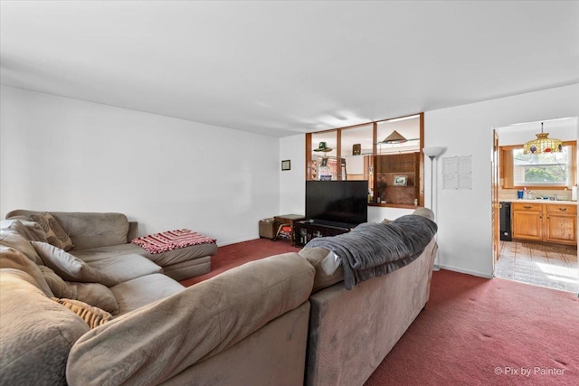 living area with light carpet