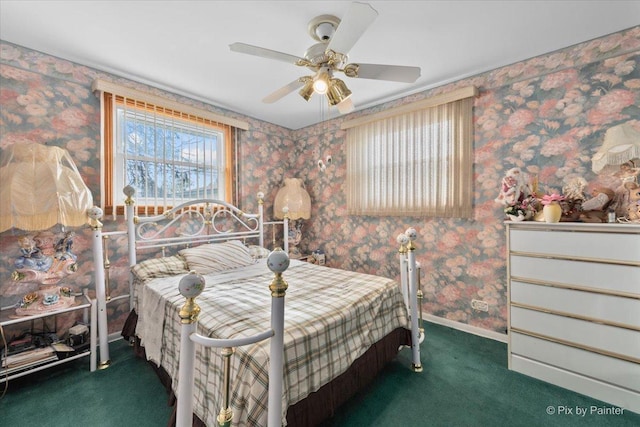 bedroom featuring carpet flooring, baseboards, wallpapered walls, and ceiling fan