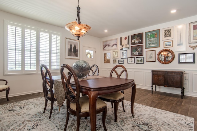 dining area with recessed lighting, dark wood finished floors, and a healthy amount of sunlight