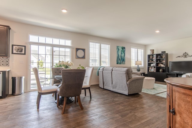 dining area with recessed lighting and dark wood finished floors