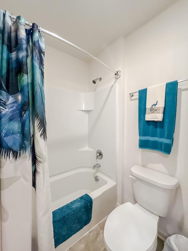 full bath featuring shower / bathtub combination with curtain and toilet