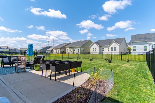 surrounding community with a residential view, an outdoor living space, a lawn, and a fenced backyard