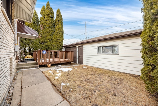 exterior space featuring a wooden deck