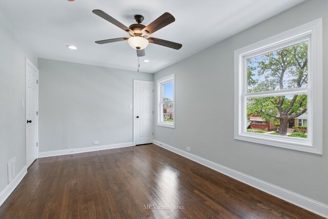 8907 S Luella Ave, Chicago, IL 60617 - empty room with baseboards, ceiling fan, dark wood-style floors, and recessed lighting
