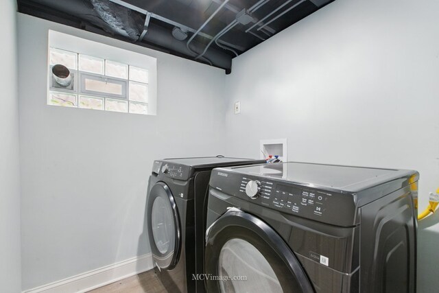 8907 S Luella Ave, Chicago, IL 60617 - washroom featuring washer and dryer, wood finished floors, and baseboards