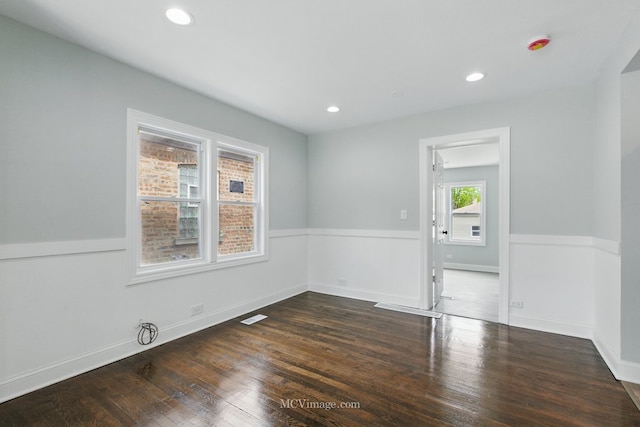 8907 S Luella Ave, Chicago, IL 60617 - unfurnished room featuring wood finished floors, recessed lighting, and baseboards
