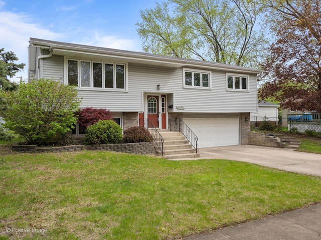 8920 Sycamore Dr, Hickory Hills, IL 60457 - raised ranch featuring fence, an attached garage, brick siding, a front yard, and driveway