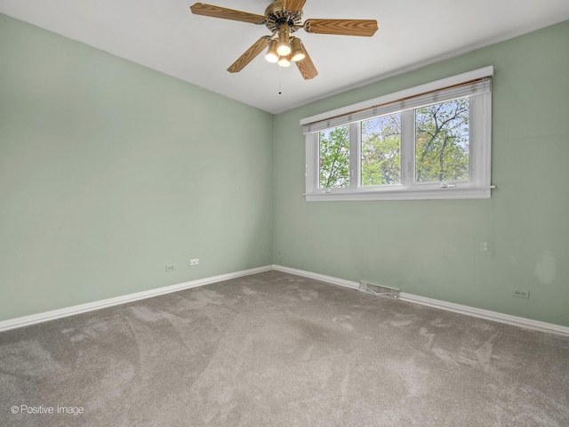 8920 Sycamore Dr, Hickory Hills, IL 60457 - carpeted empty room featuring baseboards, ceiling fan, and visible vents