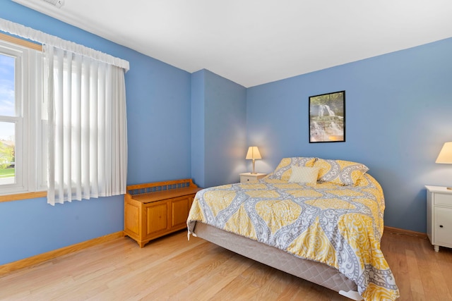 1065 Cedar Creek Dr, Lake Zurich, IL 60047 - bedroom featuring light wood-style floors and baseboards