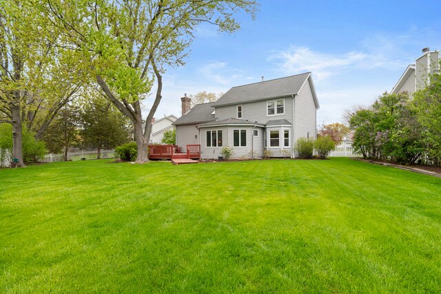 1065 Cedar Creek Dr, Lake Zurich, IL 60047 - rear view of property with a wooden deck, a chimney, and a shingled roof