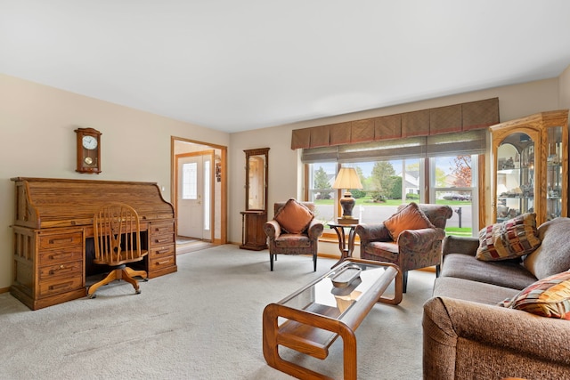 1065 Cedar Creek Dr, Lake Zurich, IL 60047 - living room featuring healthy amount of natural light, light carpet, and baseboards
