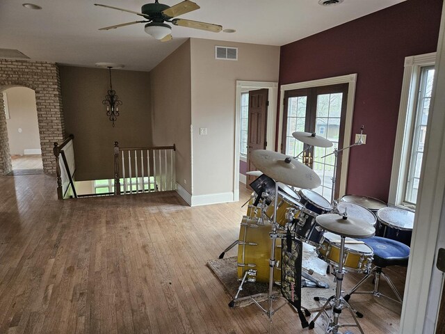 6554 N 16000e Rd, Grant Park, IL 60940 - dining room featuring a ceiling fan, wood finished floors, baseboards, and arched walkways