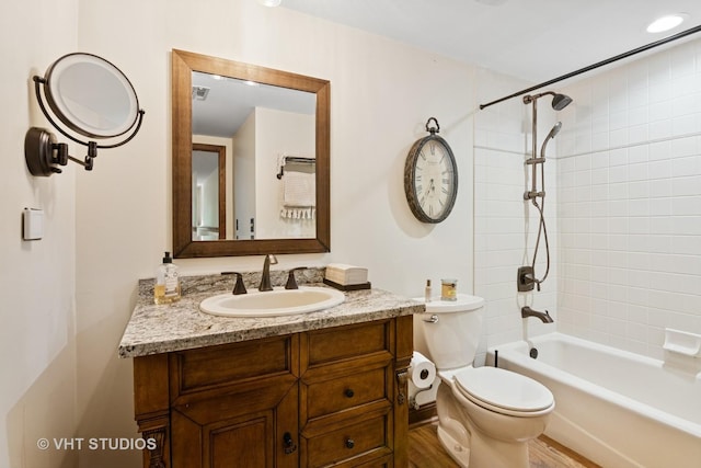 42W142 Ravine Dr, Saint Charles, IL 60175 - bathroom with toilet, vanity, bathtub / shower combination, and wood finished floors