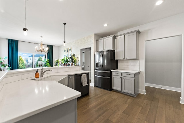 840 Coventry Cir N, Sycamore, IL 60178 - kitchen featuring black appliances, light countertops, gray cabinetry, and a sink