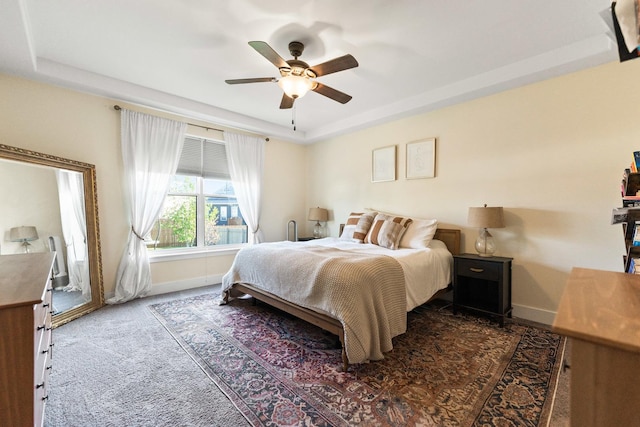 840 Coventry Cir N, Sycamore, IL 60178 - bedroom with ceiling fan, a raised ceiling, carpet flooring, and baseboards