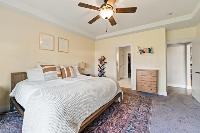 840 Coventry Cir N, Sycamore, IL 60178 - bedroom with a ceiling fan, baseboards, a raised ceiling, and carpet floors
