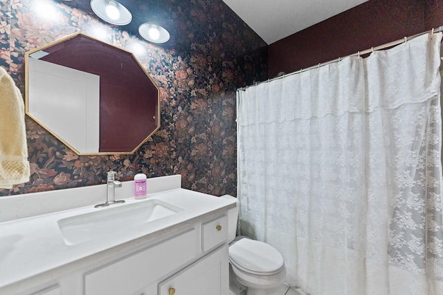 840 Coventry Cir N, Sycamore, IL 60178 - bathroom with vanity, toilet, and wallpapered walls