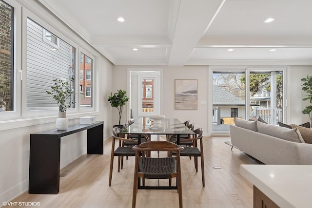 dining area with baseboards, beamed ceiling, light wood finished floors, coffered ceiling, and recessed lighting