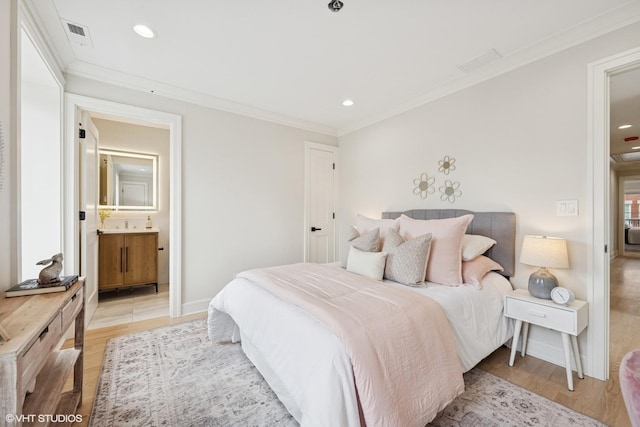bedroom featuring recessed lighting, ornamental molding, and light wood finished floors