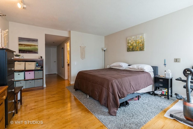 bedroom with light wood-style flooring