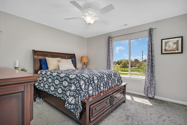 bedroom with carpet floors, a ceiling fan, baseboards, and visible vents