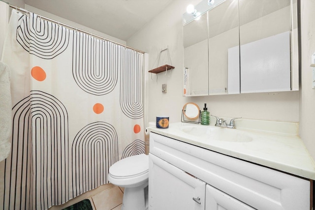 bathroom featuring toilet, curtained shower, tile patterned flooring, and vanity